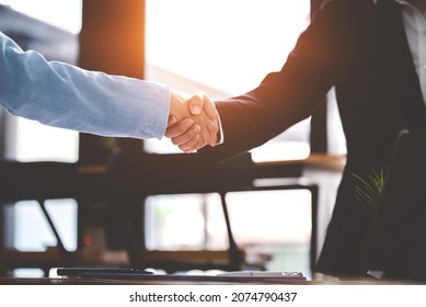 Business People Shaking Hands At Work Teamwork