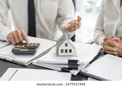 Business people signing contract making deal with real estate agent Concept for consultant home insurance
Real estate investment Property insurance security. Real estate agent.