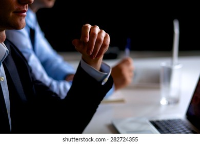 Business people sitting and discussing at business meeting, in office - Shutterstock ID 282724355