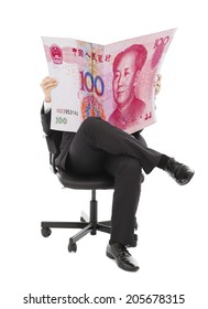 Business People Sitting On A Chair With China Currency In Hands