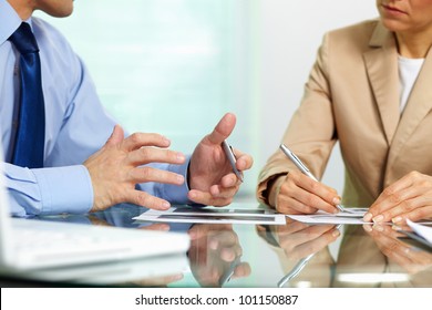 Business People Sitting Together Holding A Discussion Concerning New Strategic Movements