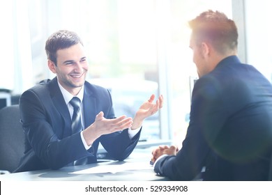 Business People Speaking During Interview In Their Office