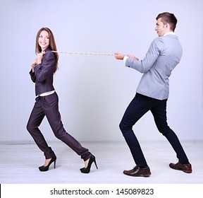 Business People Stretching Rope