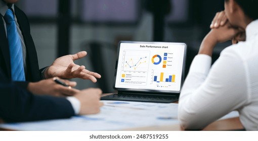 Business people talk project strategy at office meeting room. Businessman discuss project planning with colleague at modern workplace  - Powered by Shutterstock