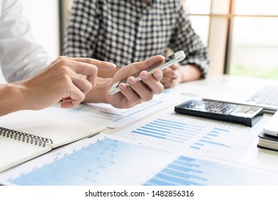 Business People Talking Discussing with coworker planning analyzing financial document data charts and graphs in Meeting and  successful teamwork Concept - Powered by Shutterstock - Get 15% off with code: PIKWIZARD15