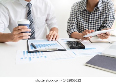 Business People Talking Discussing with coworker planning analyzing financial document data charts and graphs in Meeting and  successful teamwork Concept - Powered by Shutterstock - Get 15% off with code: PIKWIZARD15