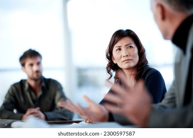 Business people talking in meeting - Powered by Shutterstock