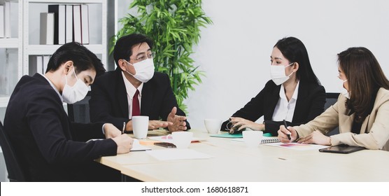 Business People Team Colleagues Wearing Hygienic Protective Mask On Face Meeting Together In Company Office. Idea For Prevent And Safe From Disease And Outbreak Of Coronavirus, Coivid-2019 Virus.