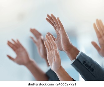 Business people, team and hands raised for question, vote or feedback in conference room meeting closeup. Group, crowd and palm for answer, volunteer and audience ask in training seminar for learning - Powered by Shutterstock