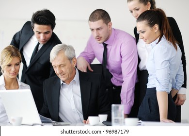 Business People  Team  At A Meeting In A Light And Modern Office Environment.