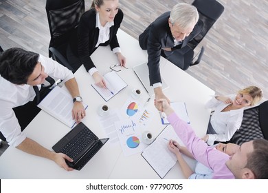 Business People  Team  At A Meeting In A Light And Modern Office Environment.