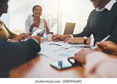 Business people, teamwork and paperwork in meeting with data analysis on market research or company infographic. Collaboration, diversity group or strategy on target growth and brainstorming of stats - Powered by Shutterstock