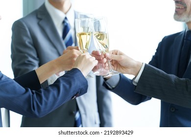 Business People Toasting With Sparkling Wine