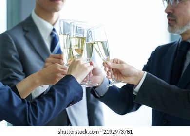 Business People Toasting With Sparkling Wine