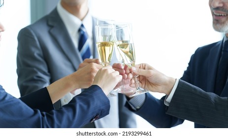 Business People Toasting With Sparkling Wine