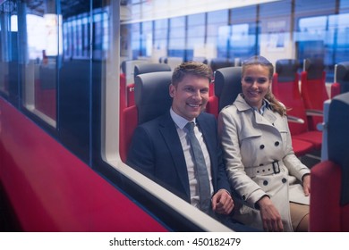 Business People In A Train