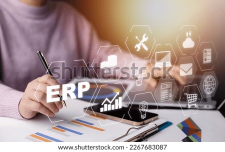 Business people using a laptop with document management for ERP. Enterprise resource planning concept,Enterprise Resource Management ERP software system for business resources plan presented.