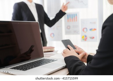 Business people using laptop  and Financial charts  at meeting office - Shutterstock ID 415715599