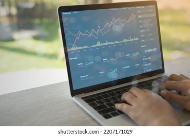 Business People Using Laptop With Various Type Of Financial And Investment Products In Bond Market. I.e. Crypto Currency, Bonds, Stocks. Sustainable Portfolio Management.