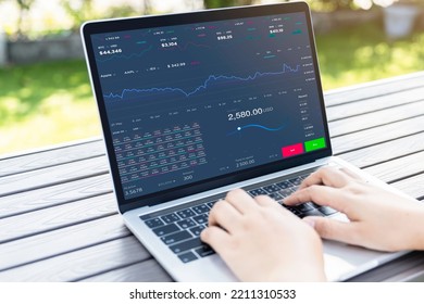 Business People Using Laptop With Various Type Of Financial And Investment Products In Bond Market. I.e. Crypto Currency, Bonds, Stocks. Sustainable Portfolio Management.