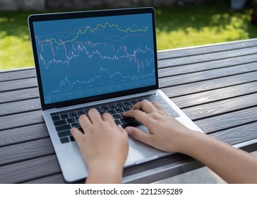 Business People Using Laptop With Various Type Of Financial And Investment Products In Bond Market. I.e. Crypto Currency, Bonds, Stocks. Sustainable Portfolio Management.