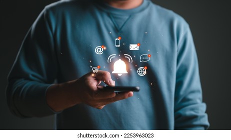 Business people using smartphone with virtual bell ringing for application notification alert concept, New email, digital marketing, electronic message alert. - Shutterstock ID 2253963023