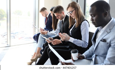 Business people waiting for job interview - Shutterstock ID 447401257
