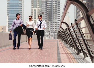 Business People Walking At Big City Talking Conversation Happy Successful.