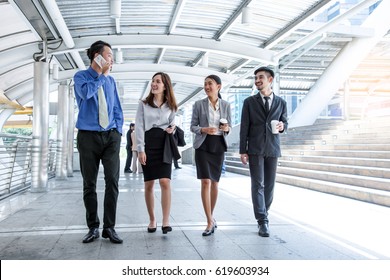 Business People Walking Forward, Modern City Background, Business Teamwork Concept.