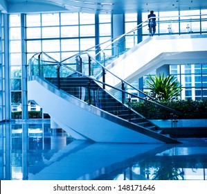 Business People Walking In The Lobby. Motion Blur