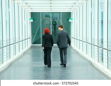 Business People Walking In An Office Building