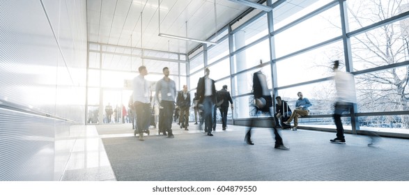 Business People Walking On A Modern Walkway