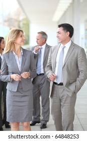 Business People Walking Outside A Congress Center