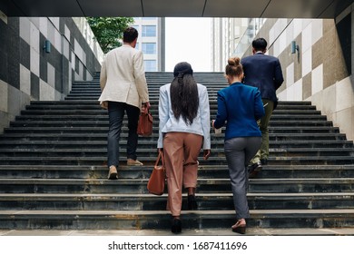 Business People Walking Up The Stairs When Going To Work In The Morning