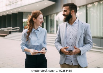 Business People Walking And Talking Outdoor