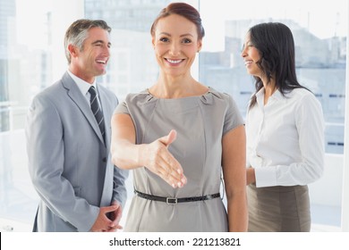 Business People Welcoming New Staff To Work