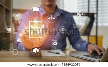 business people who use computers to manage documents online document database and digital file storage systems or software record keeping database technology file access document sharing.