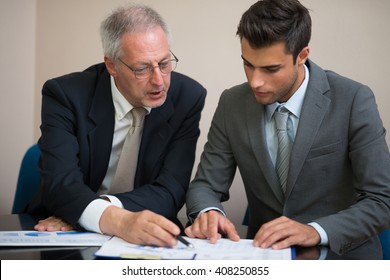 Business people at work in their office - Powered by Shutterstock