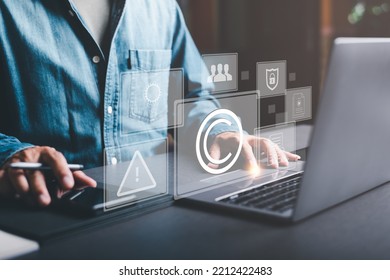 Business people work through laptops, concepts of copyright or intellectual property patents, piracy protection, proprietary representation, legitimate innovations and inventions, patent campaigning. - Shutterstock ID 2212422483