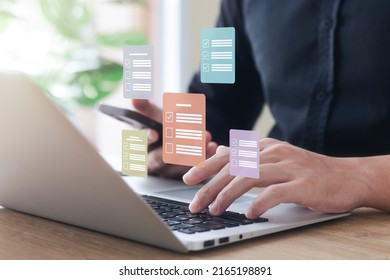 Business people working with computers and smartphones A symbol of top service ISO Certification Document Management System Quality assurance. - Shutterstock ID 2165198891