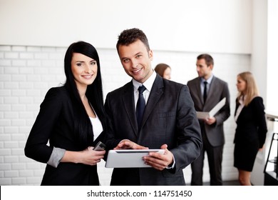 business people working with digital tablet - Powered by Shutterstock