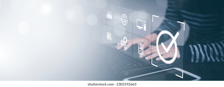 Business people working with laptop or computers service Quality assurance, Quality Assurance Control and improvement. Standardization, certification concept. Compliance to regulations and standards.  - Shutterstock ID 2303192663