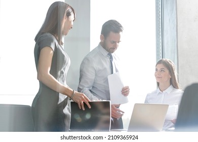 Business People Working At Laptop In Conference Room Meeting