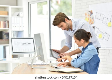 Business People Working In Office On Desktop Computer