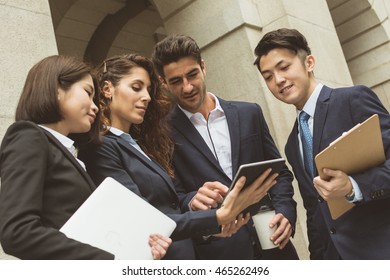 Business People Working Outside Office