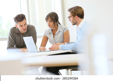 Business People Working Together In Meeting Room