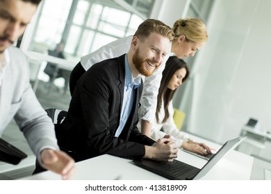Business people working together in the office - Shutterstock ID 413818909