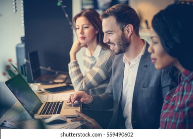 Business People Working Together In Office.