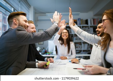 Business people working together on project and brainstorming in office - Powered by Shutterstock