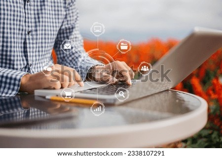 Business people working in the work area with laptop and tablet at the desk. business concepts, area outdoor.